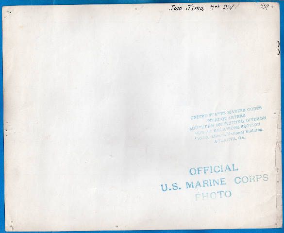 1945 USMC Iwo Jima Marines Bring Wounded to Aid Station  