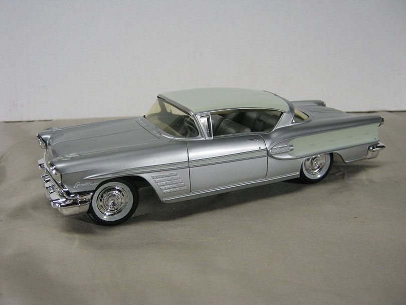 1958 Pontiac Bonneville HT Promo, graded 9 out of 10.  