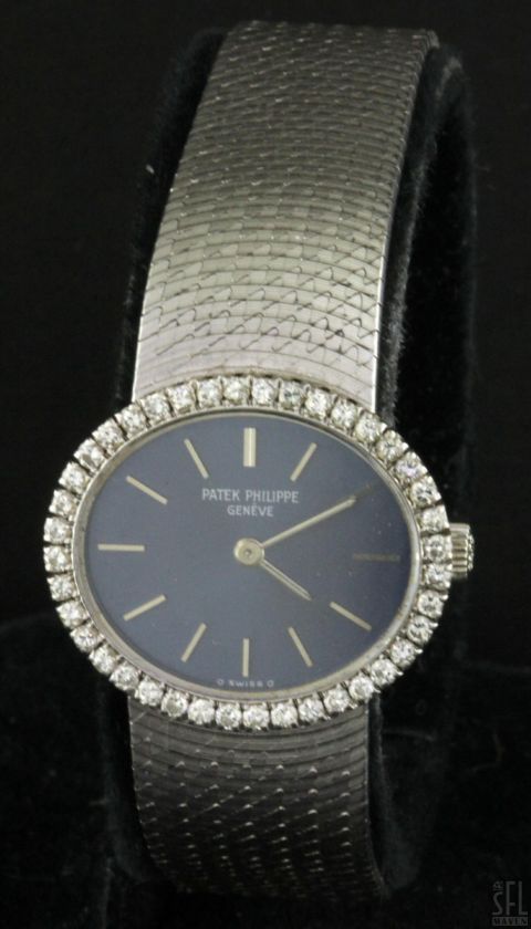 PATEK PHILIPPE 18K WHITE GOLD .80CT VS1/G DIAMOND BEZEL LADIES WATCH W 