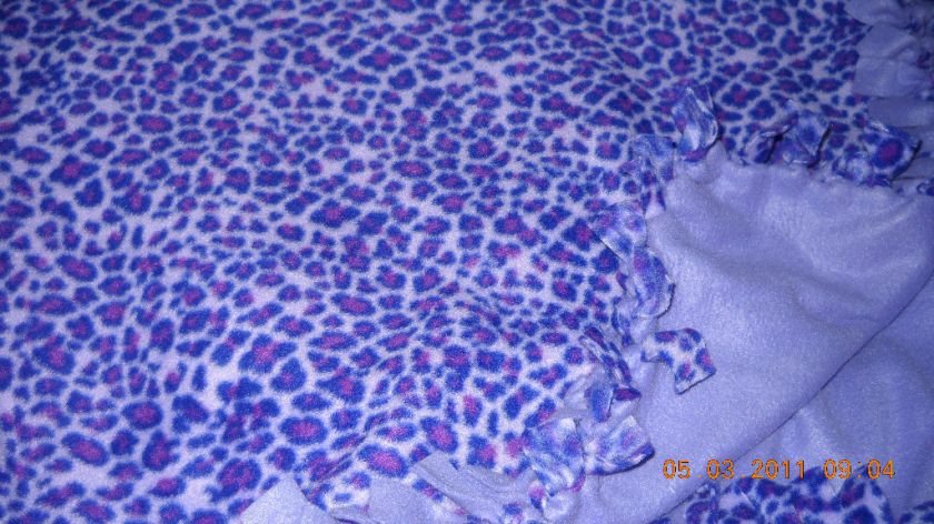 PURPLE ANIMAL PRINT TIE BLANKET  